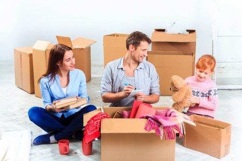 Packing boxes and furniture prepared for a local flat removal in Swiss Cottage