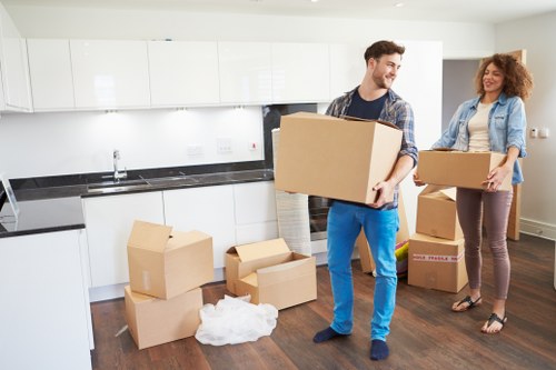 Loading furniture into a removal truck for a Swiss Cottage move