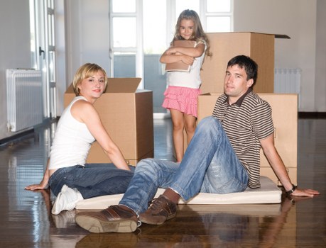 Packed boxes and furniture ready for apartment removals